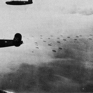 The 486th fly over the beaches of Normandy, near Caen, on June 6th, 1944.