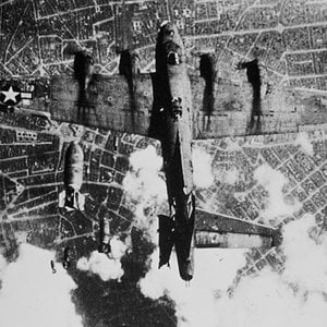 Bombs drop on B-17 below 3