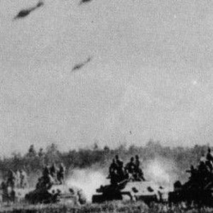 A formation of Il-2 diving over a german Panzer column