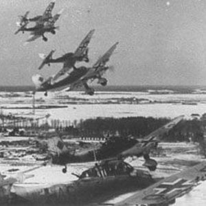 Ju-87s peel off to attack