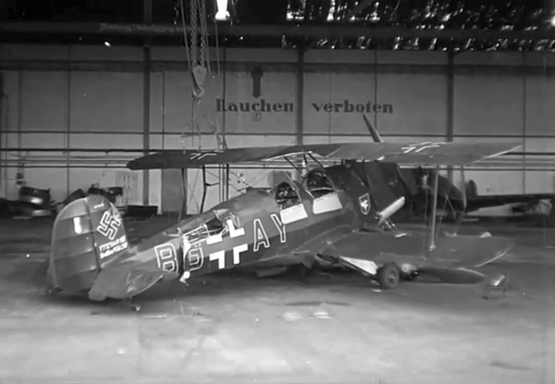A damaged Bücker Bü 131 at the Celle-Wietzenbruch airfield, Germany 1945