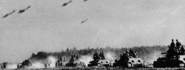 A formation of Il-2 diving over a german Panzer column