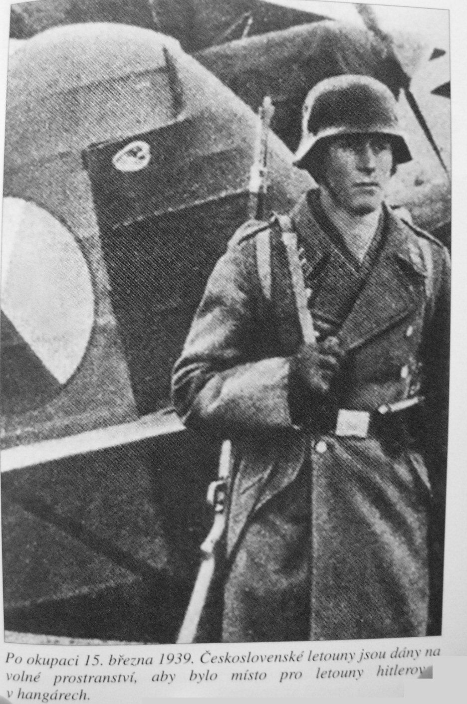 A German soldier is guarding a captured Czechoslovak Avia B-534 Biplane Fig