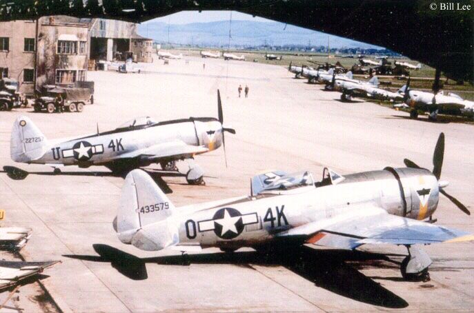 Aa view through the hangar at Fritzlar Germany, showing two 506th P-47's. I