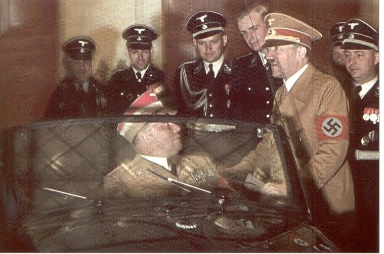 Adolf Hitler and officers are introduced to the VW Beetle Cabriolet, 1939.