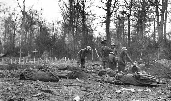 Americans burying their dead, Bois de Consenvoye, France, November 8, 1918.