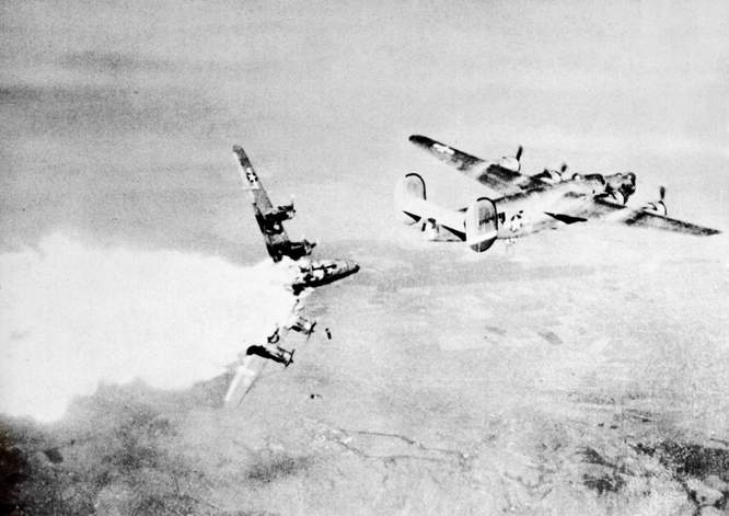 B-24 Breaks-Up Over Germany