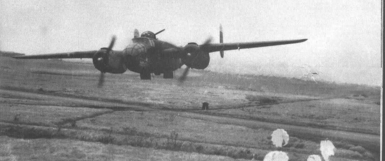 B-25 dropping parachute bombs