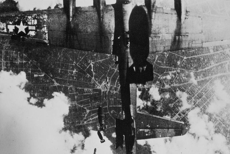 Bombs drop on B-17 below 2