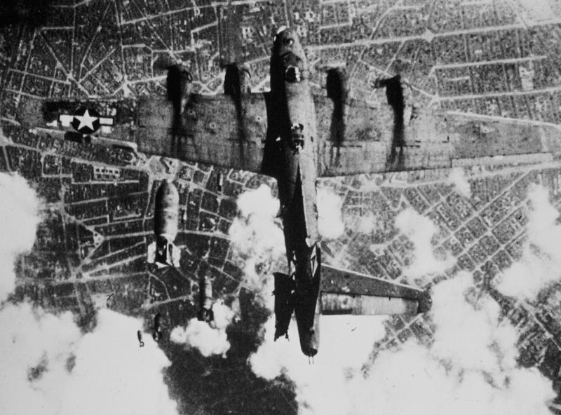 Bombs drop on B-17 below 3