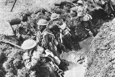 British infantry knee deep in mud.