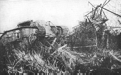 British tank breaking through barbed-wire