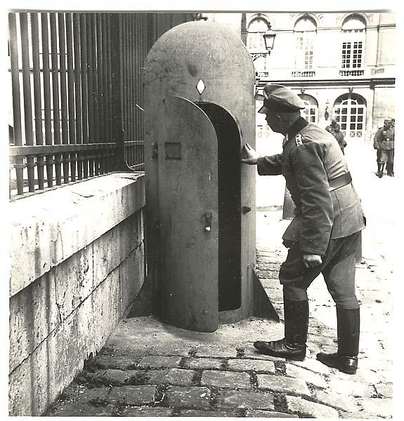 German Officer examining a strange object