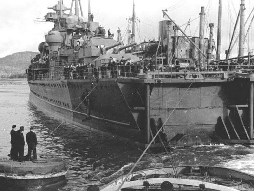 German-Ship-Prinz-Eugen-Moored-alongside-repair-vessel-Huscaran-01