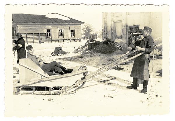 German Soldiers Playing With a Sledge