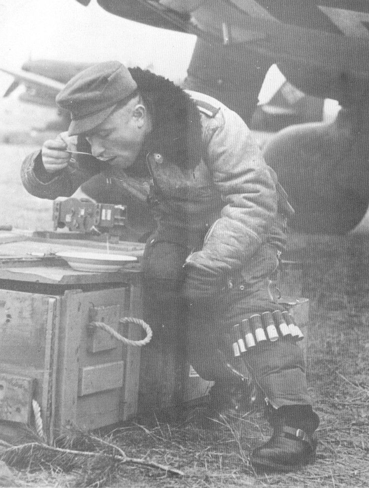 German Stuka pilot giving a break to lunch