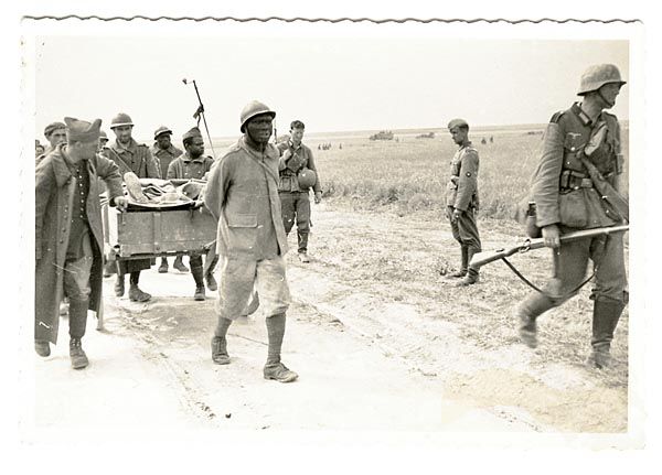 Germans escorting French POW's