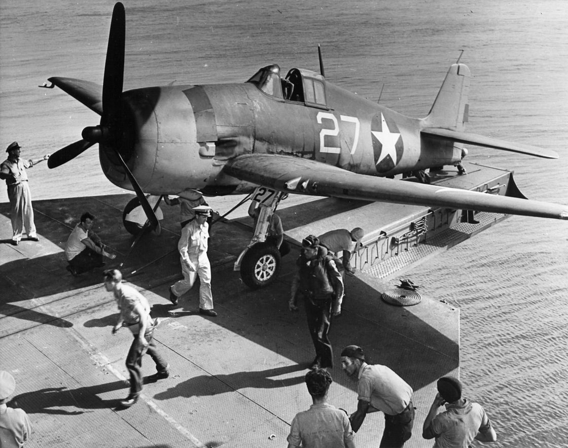 Grumman F6F-3 Hellcat "White 27", VF-1, the hangar deck catapult, USS Yorktown (CV-10). 1943 (1)