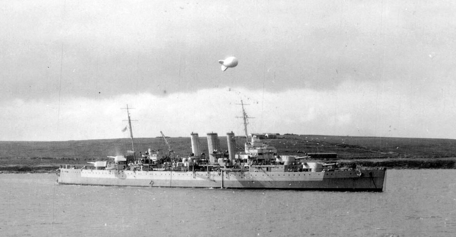 HMS Dorsetshire, a County class heavy cruiser.