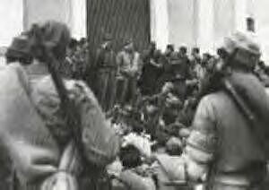 Italian Partisans receiving OSS briefing