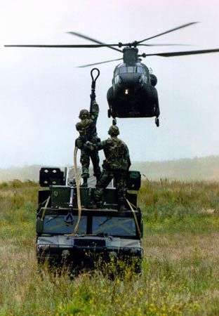 Japanese Humvee Avenger Being Hooked up to CH-47 Chinook