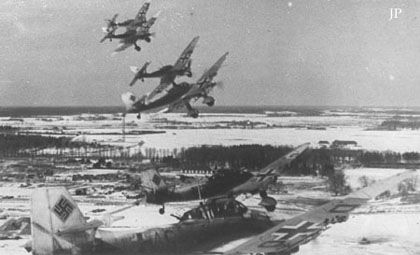 Ju-87s peel off to attack