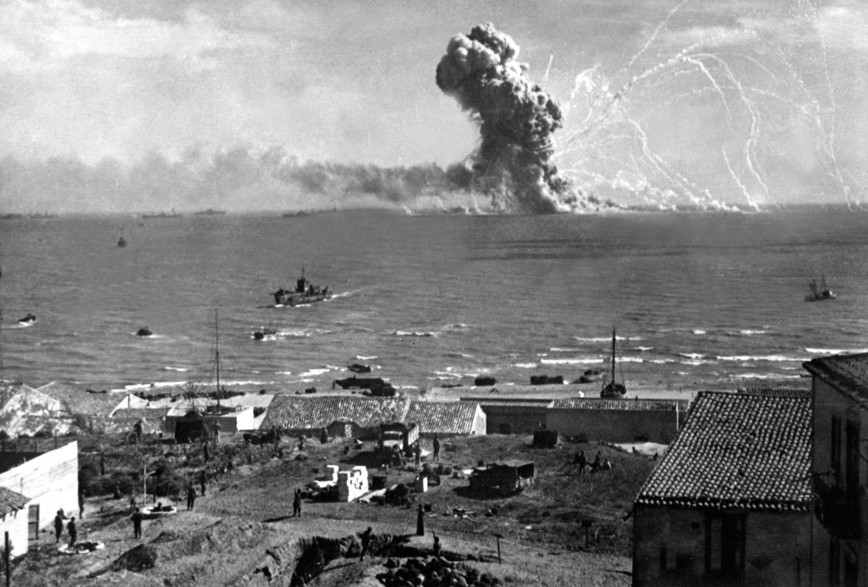 Liberty Ship Exploding off_theCoas of Sicily after_being_hit_by_a_Hensche