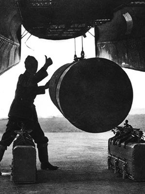 Loading a Lancaster bomber with 4000-lb. bomb,