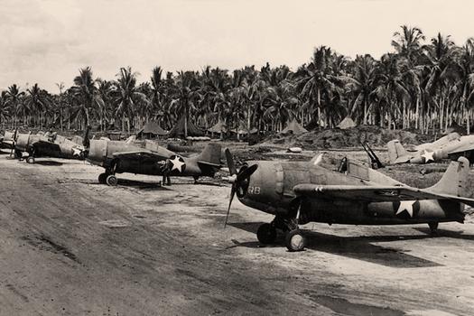 Marine F4F Wildcats parked on Henderson field, Guadalcanal, 1942