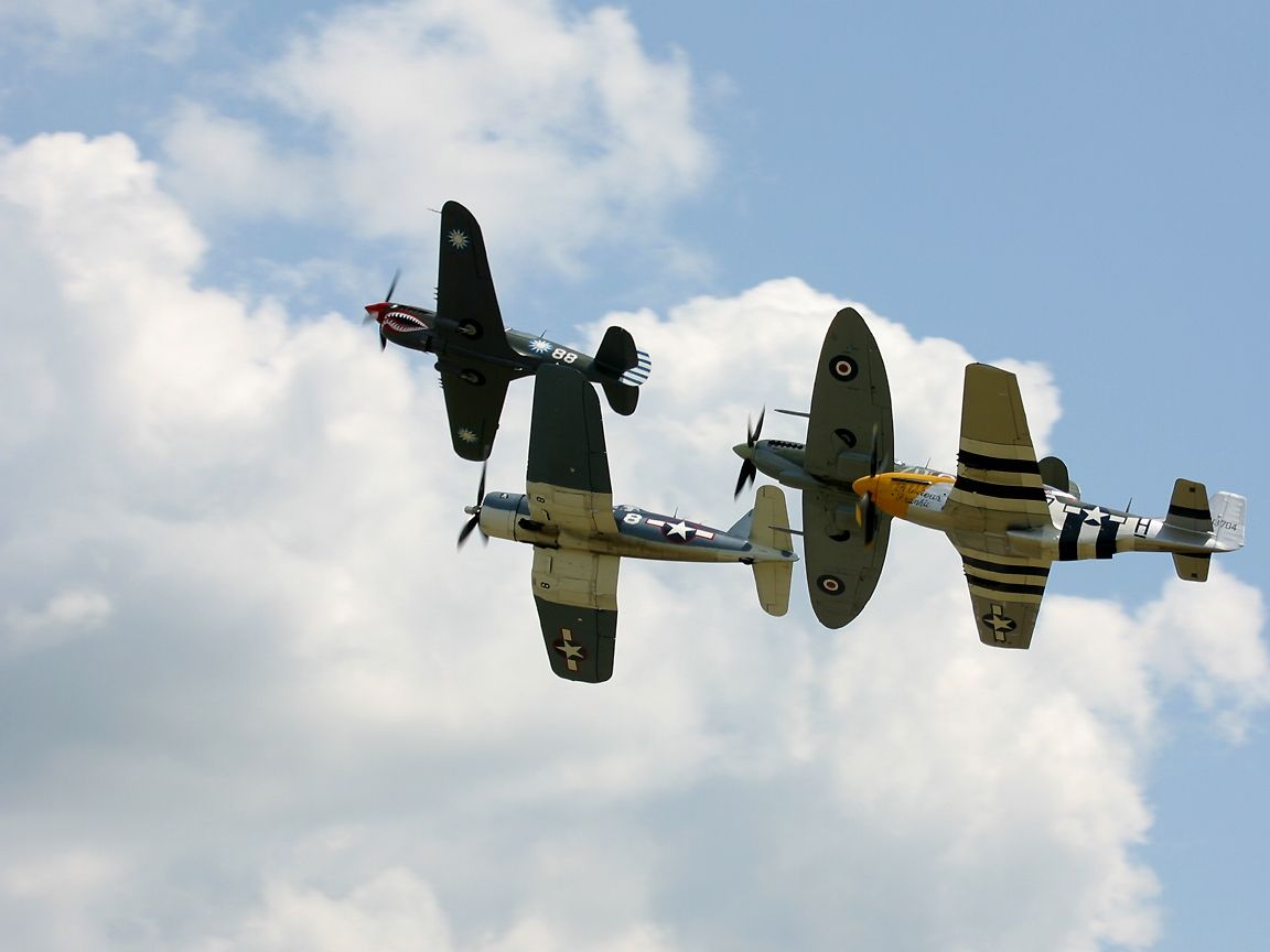 P-40 Kittyhawk, F4U Corair, Supermarine Spitfire, and P-51D Mustang