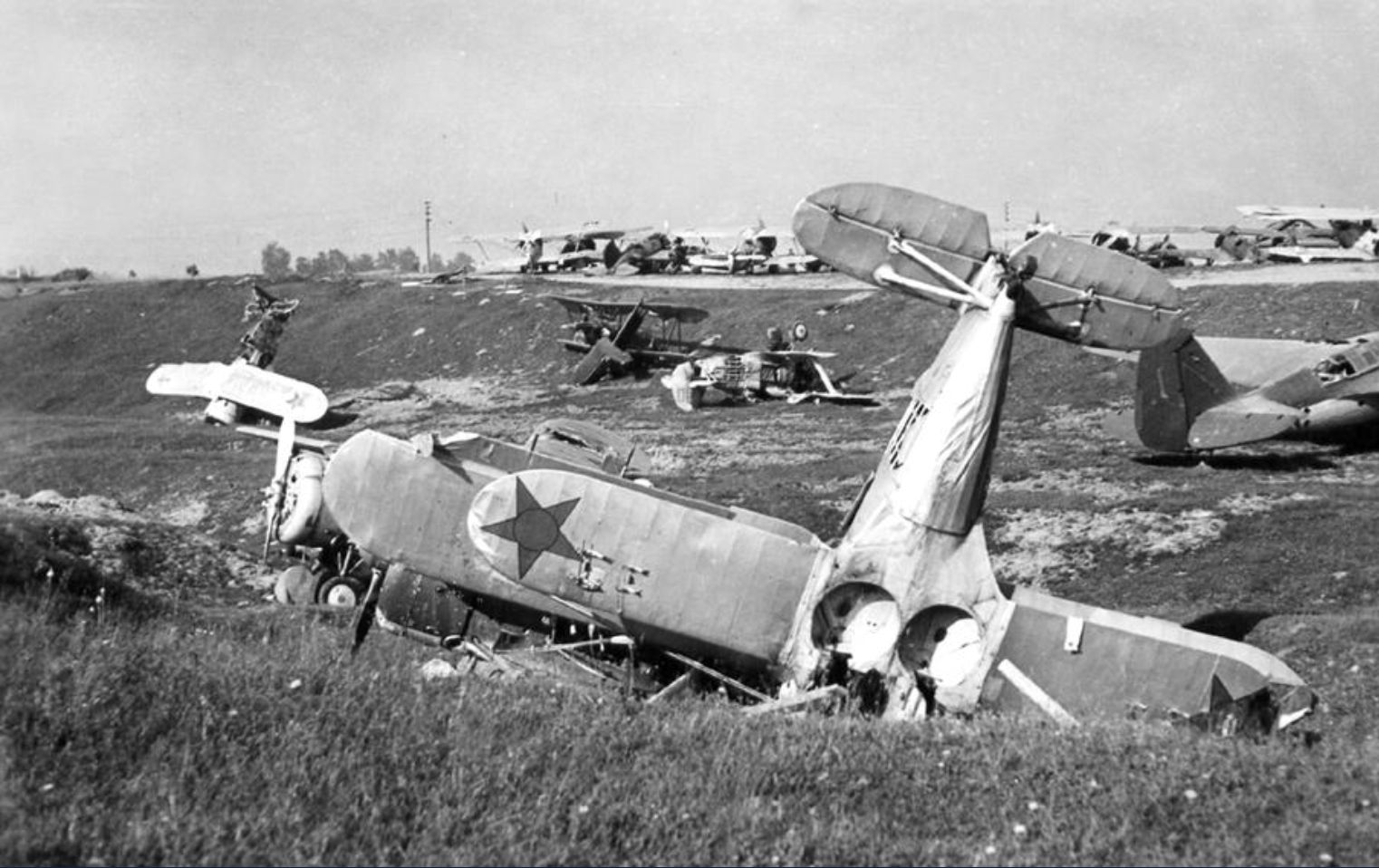 Polikarpov I-153 at a scrapyard , 1941