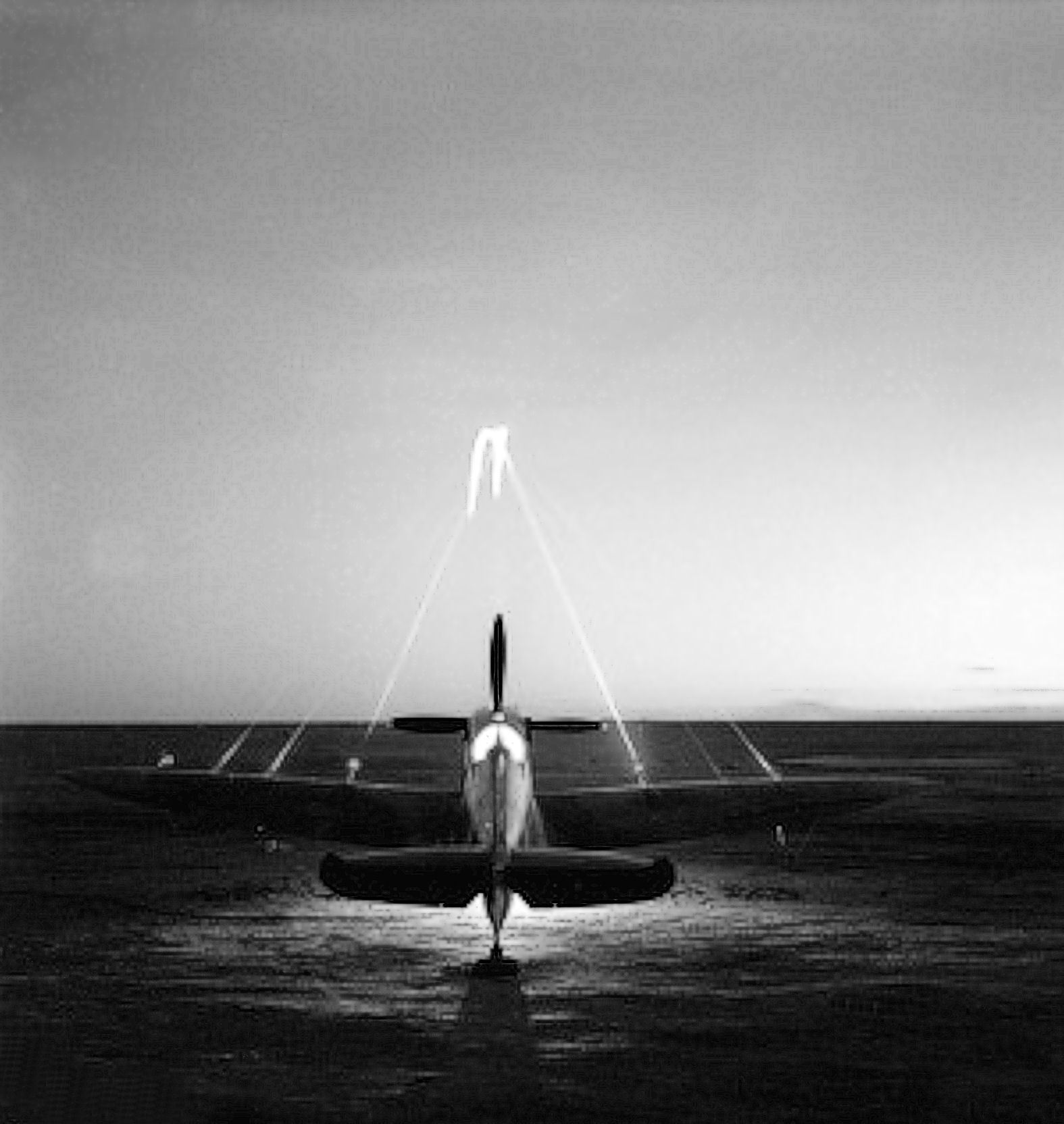 RAAF_Supermarine_Spitfire_451Sqn_cannons_blazing_ranged_-_300yds_El_Daba_Eg