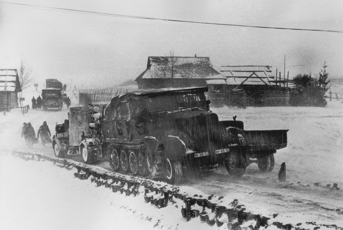 Sd.Kfz.7 prime mover towing an 88mm FlaK AA gun in Russia, the winter 1941