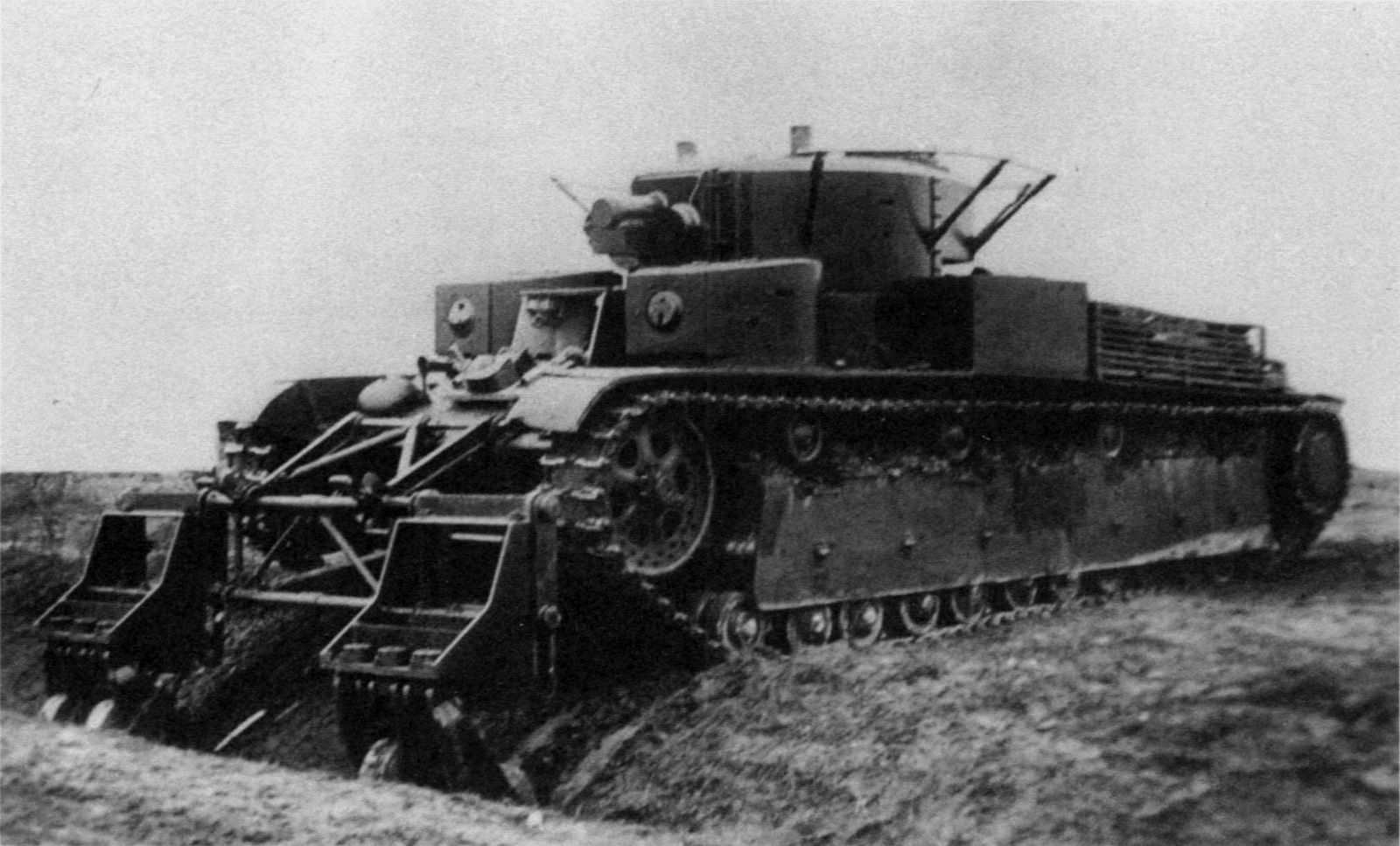 Soviet_T-28_heavy_tank_with_mine_trawls_during_a_test_to_cross_a_trench_in_