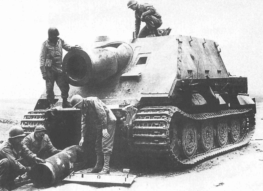Sturmtiger_abandoned_and_blown_by_its_crew_and_captured_by_US_troops
