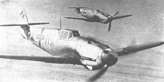 Two Bf 109 in flight
